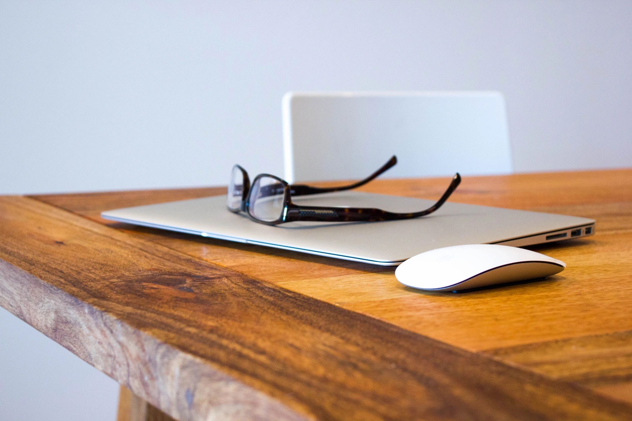 Picture of a desk with a laptop.